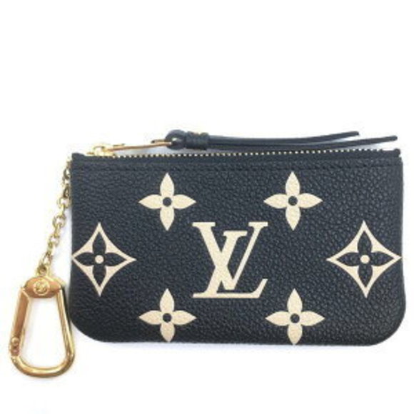 Louis Vuitton Pochette Empreinte Leather - Picture 1 of 7